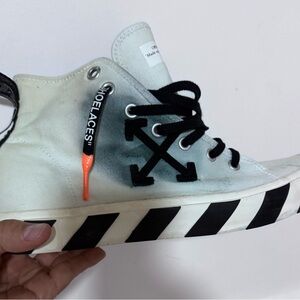 Off-White Black and White High-Top Sneakers with Striking Sole